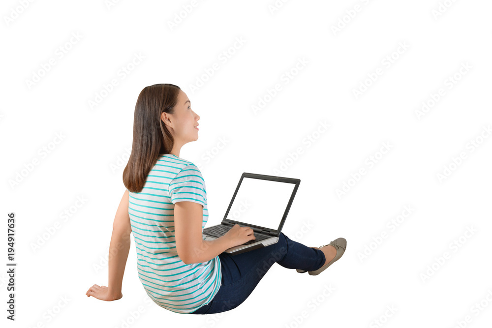 Young creative woman sitting in the floor with laptop Young creative woman sitting in the floor with laptop