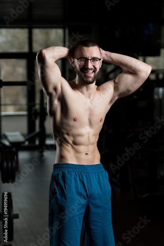Portrait Of A Physically Fit Muscular Nerd Man