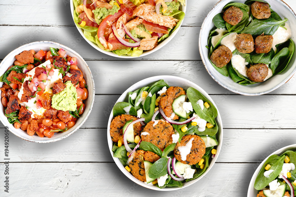 various salad bowls meatballs green mains starter diet light dish from above table few many choice healthy organic various salad bowls meatballs green mains starter diet light dish from above table few many choice healthy organic