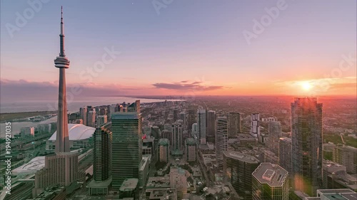 4K Timelapse Sequence of Toronto, Canada - Day to Night timelapse of Toronto as seen from a rooftop in the financial district photo