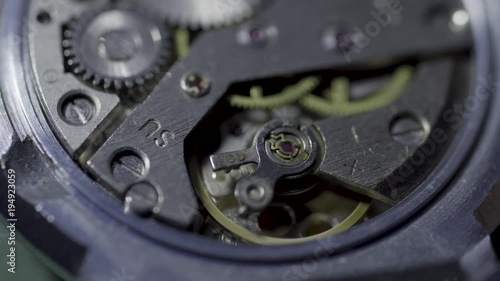 Wallpaper Mural Old watch mechanism macro loop. Vintage mechanism working, closeup shot with soft focus. Clock mechanism.Vintage Watch Gears Movement Macro Torontodigital.ca