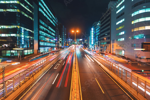 View of motion blurred traffic in Shibuya, Tokyo, Japan at night