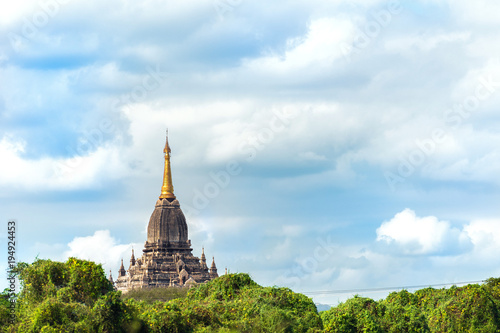 View of the facade of the building of the Shwegugyi temple in Bagan, Myanmar. Copy space for text. © ggfoto