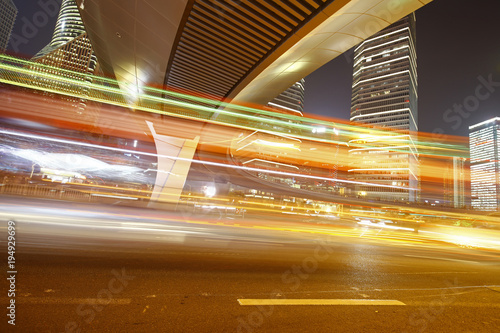 Photography the light trails on the modern building background in shanghai china