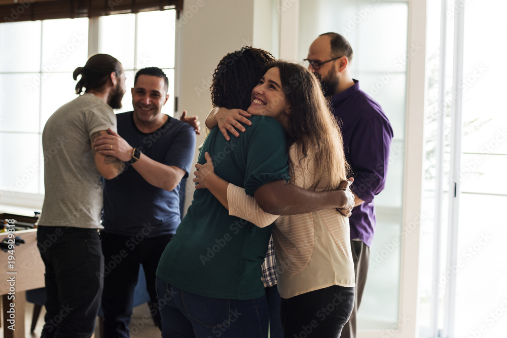Friends hugging each other Friends hugging each other
