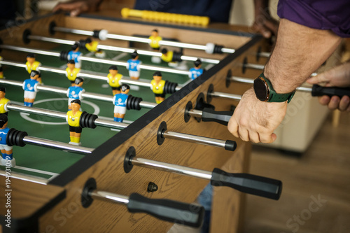 People playing table football