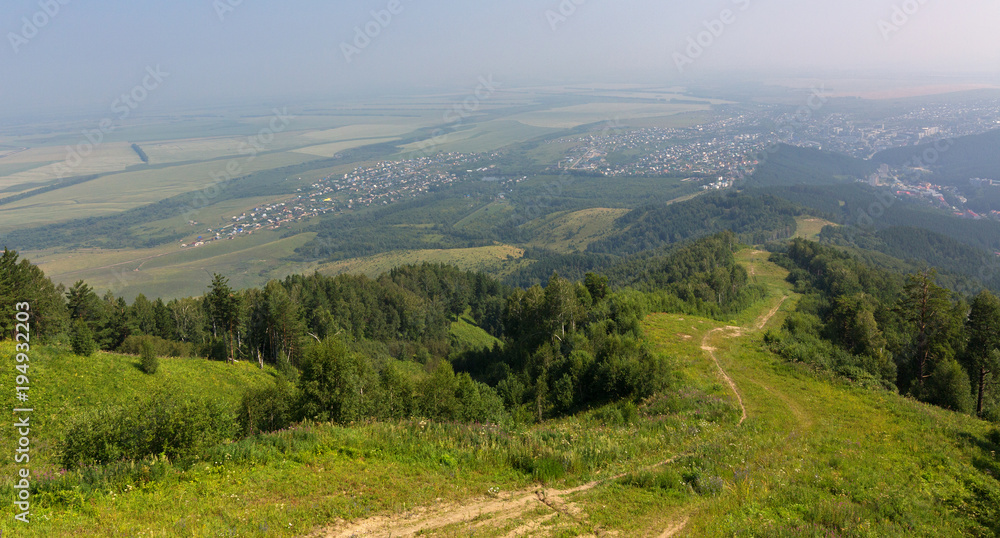 Beautiful summer view from Mount Tserkovka to resort of Belokurikha in the Altai Krai