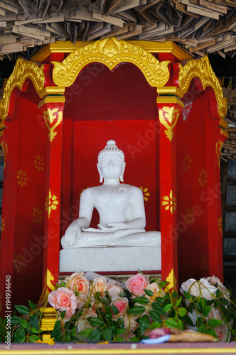 White Buddha statue in temple,Thailand.