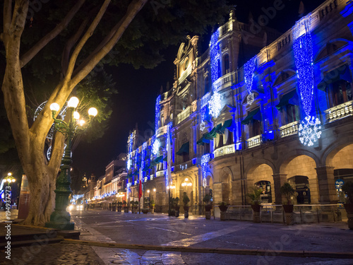 Puebla  Mexico  South America - January 2018   Town of Puebla at night  street and church decorated with lights 