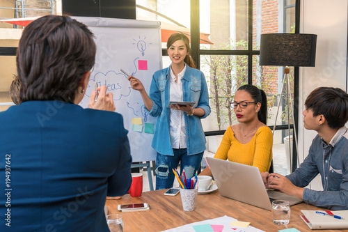 Group Of Asian and Multiethnic Business people with casual suit working with happy action and celebrate in the modern Office, people business group concept