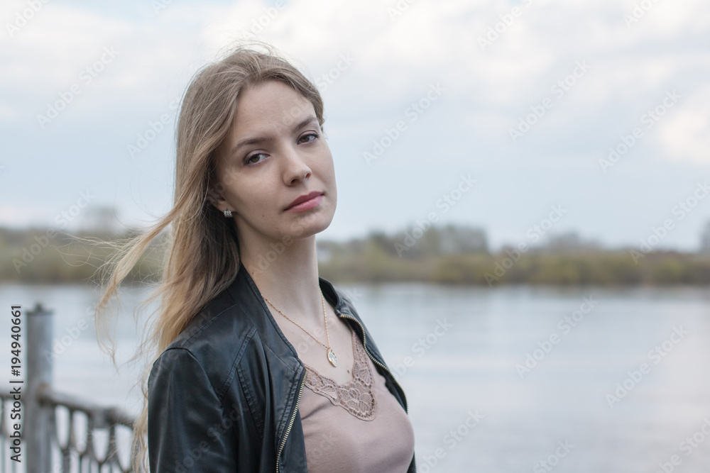 Girl with blond hair on the promenade Girl with blond hair on the promenade