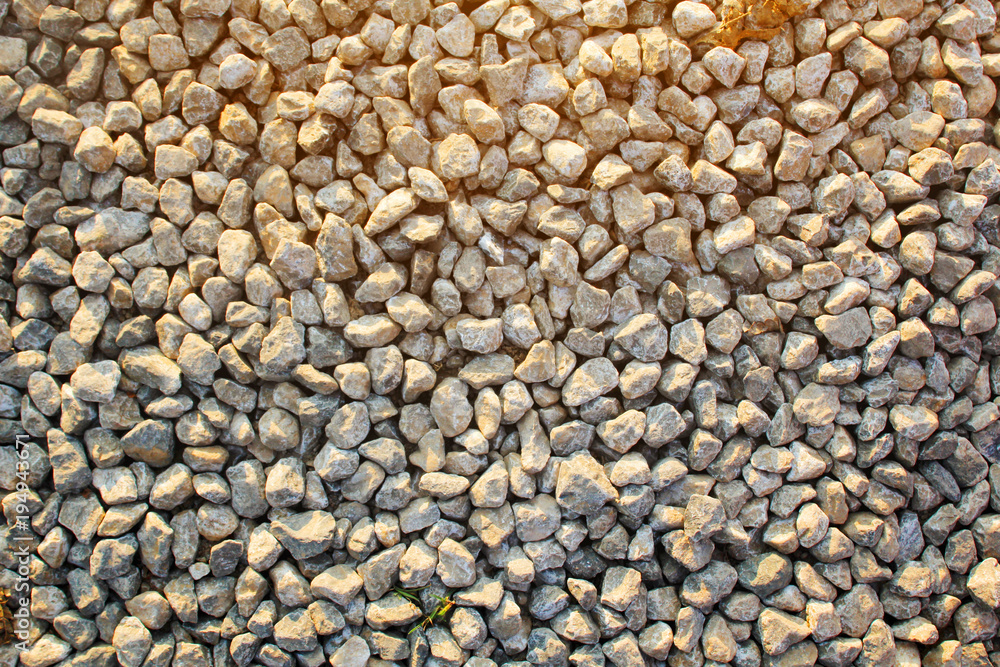 ground stones pattern with warm sun light and shadow for background ground stones pattern with warm sun light and shadow for background