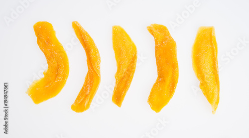 Dried Mango or Dried Mango slices on a background.
