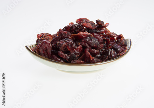 dried cranberries or dried fruits on a background.