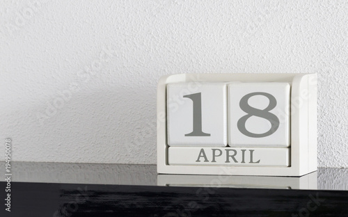 White block calendar present date 18 and month April