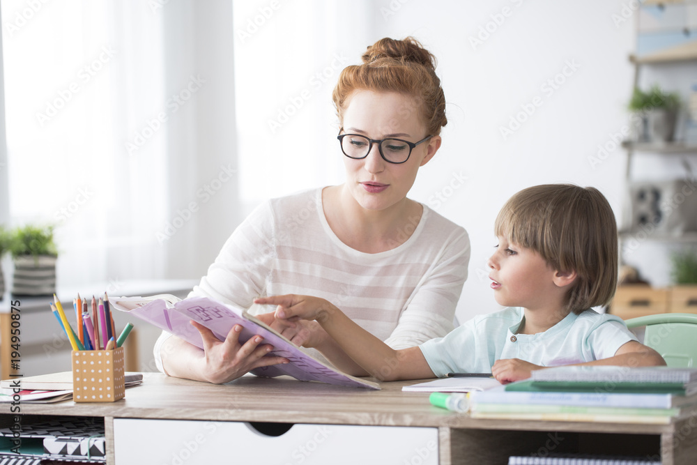 Young boy doing homework Young boy doing homework