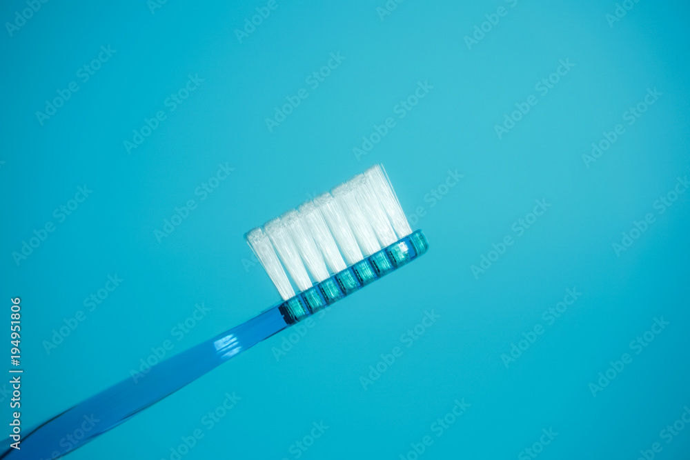 Close-up of the toothbrush. 歯ブラシのクローズアップ　水色背景