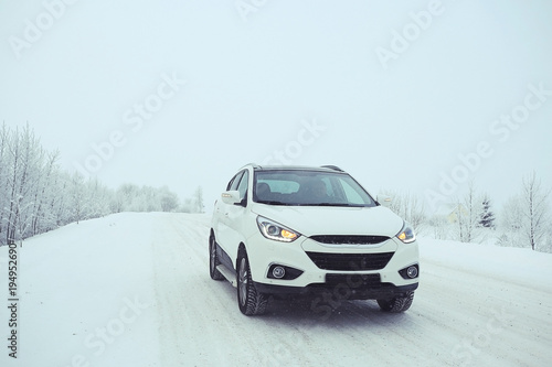car in a snowy landscape nature white winter snow
