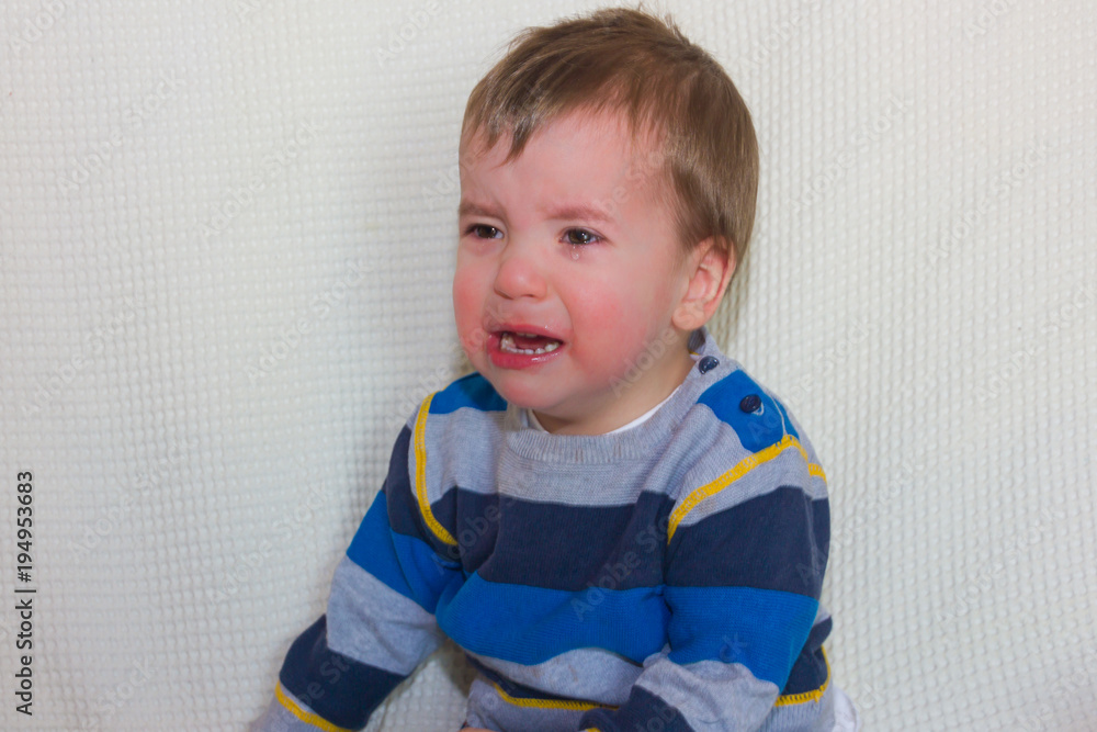 A strong crying. The child is crying very much, the upset kid. A strong crying. The child is crying very much, the upset kid.
