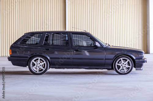 Old, black, German family car side view