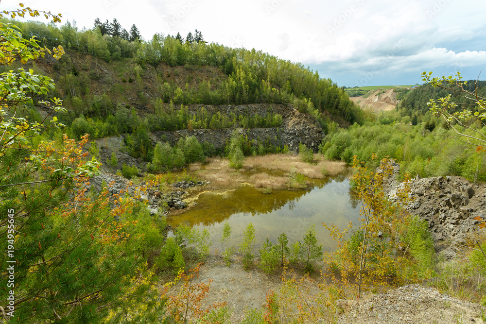 abandoned flooded quarry, Czech republic