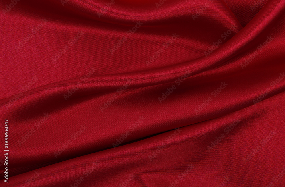 Fototapeta premium Smooth elegant red silk or satin luxury cloth texture as abstract background. Luxurious background design