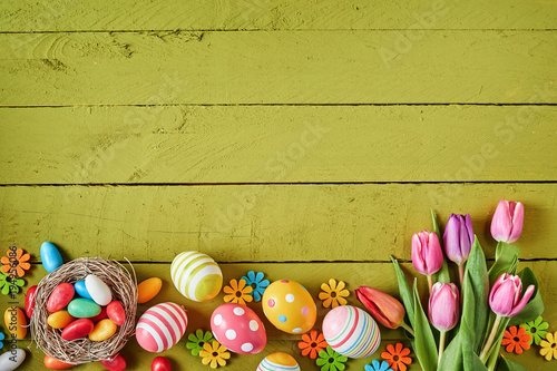 Photography Colorful Easter border on green wood
