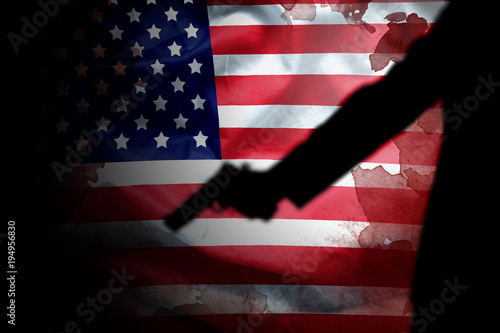 Canvas-taulu handgun in gunman hand with blood stain on American flag