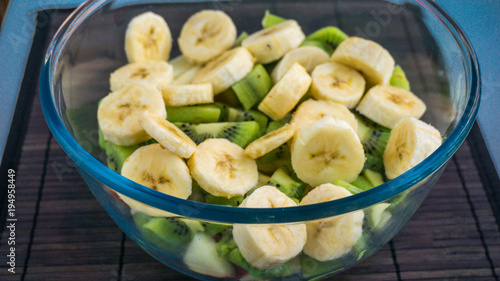 Fruit salad in transparent bowl