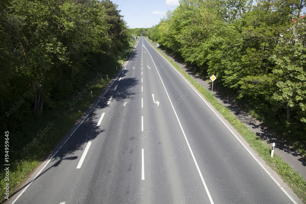 Fototapeta premium aerial of street with arrows as transportation symbol