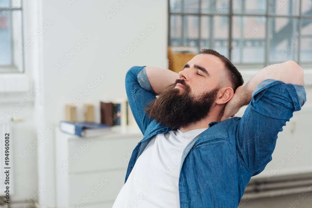 Bearded man taking a moment to relax Bearded man taking a moment to relax