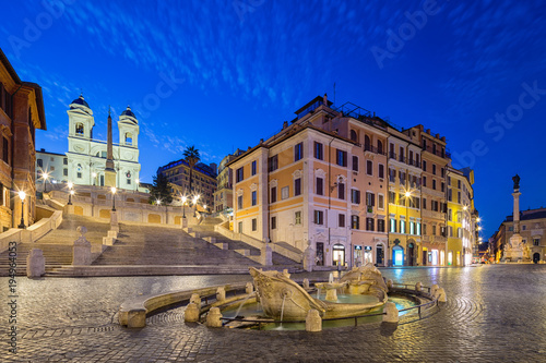 Night view of Spanish Steps and Fontana della Barcaccia in Rome, Italy.
