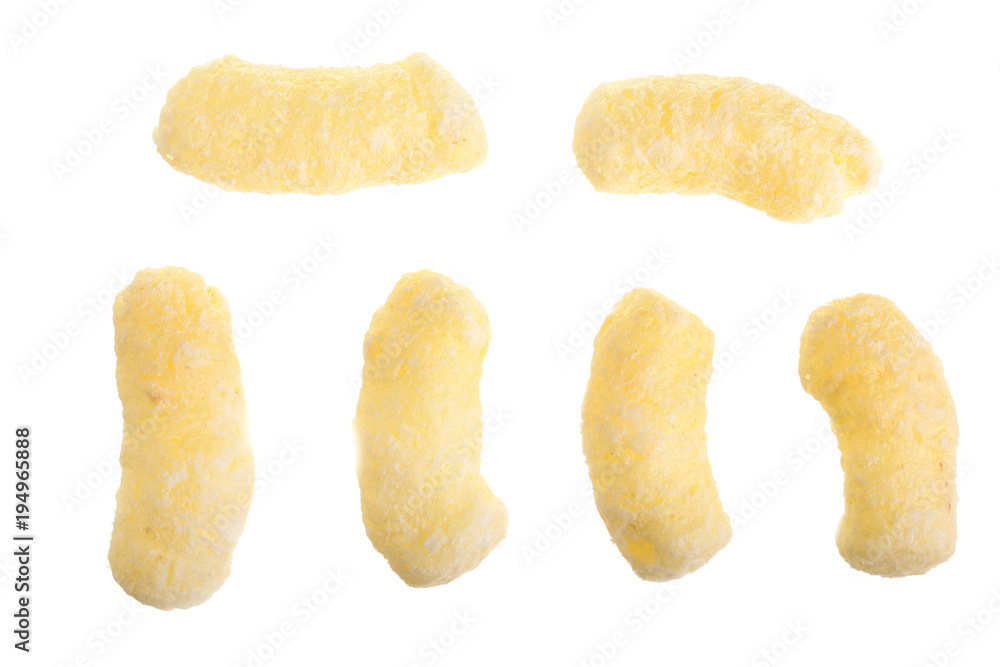 Sweet crunchy corn sticks or snacks isolated on white background. Top view. Flat lay Sweet crunchy corn sticks or snacks isolated on white background. Top view. Flat lay