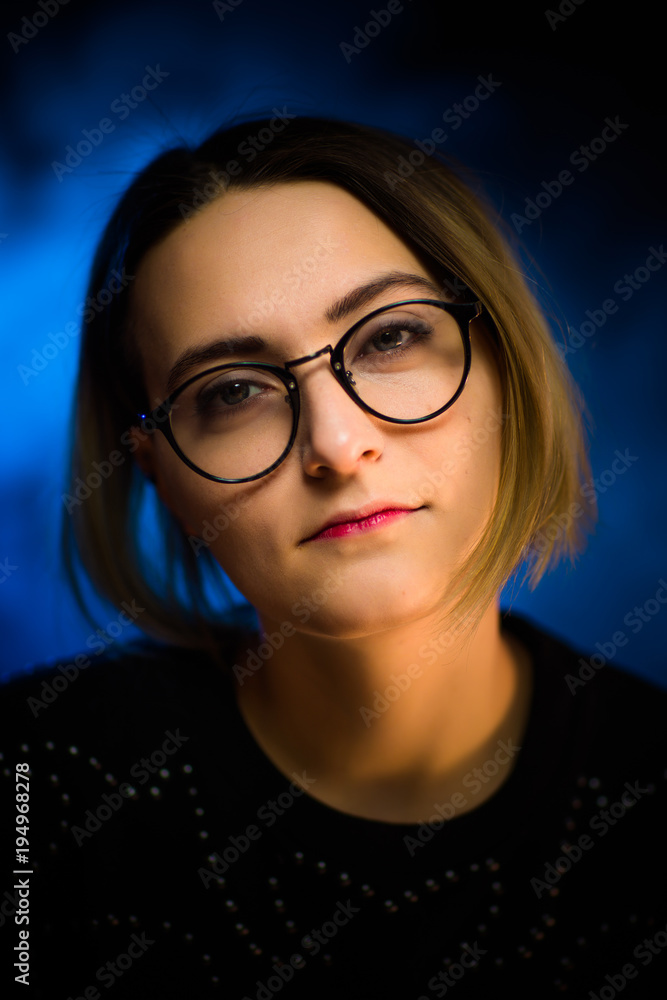 portrait emotional young girl on blue background portrait emotional young girl on blue background