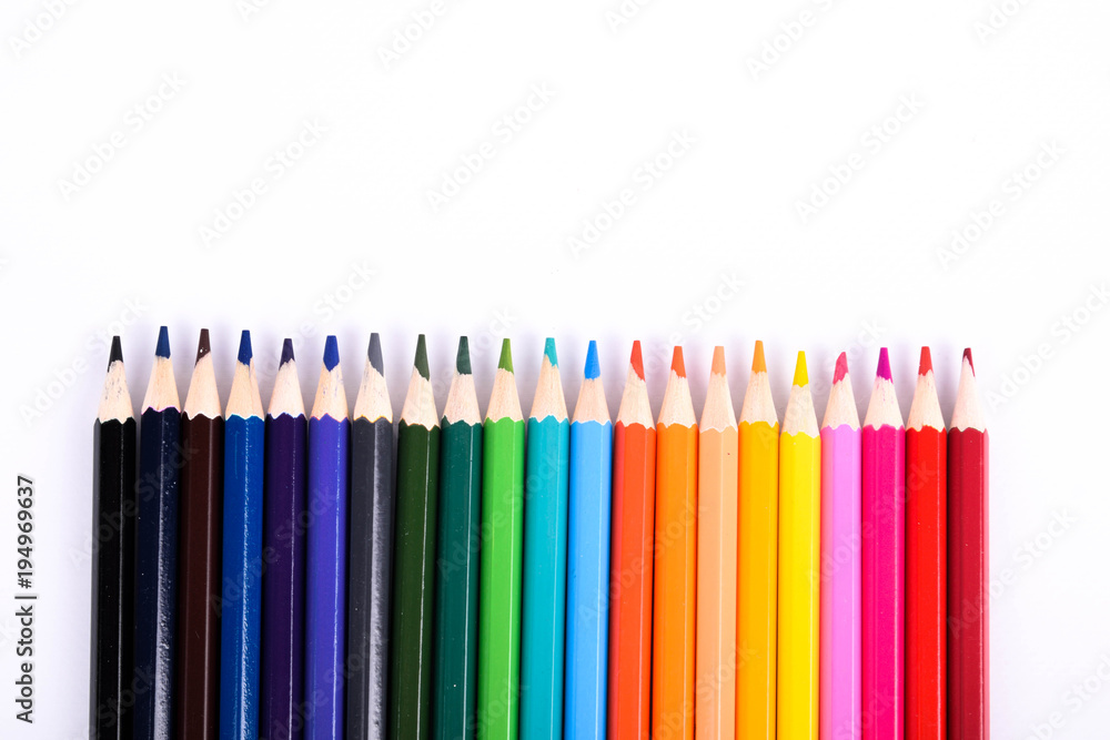 Colorful pencils pattern isolated on white background. Top view colorful of color pencils.Colored pencils, isolated on the white background. Color pencil with copy space isolated on white background, Colorful pencils pattern isolated on white background. Top view colorful of color pencils.Colored pencils, isolated on the white background. Color pencil with copy space isolated on white background,