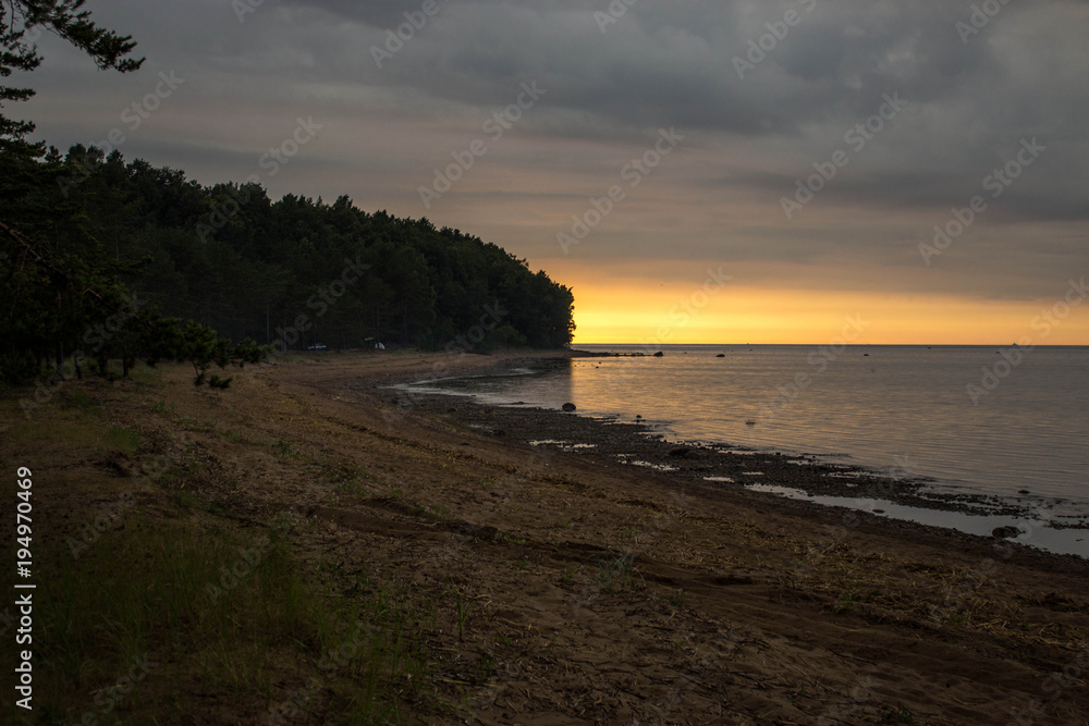 Fiery sunsets on the shore of the Gulf of Finland, Leningrad Region, Russia