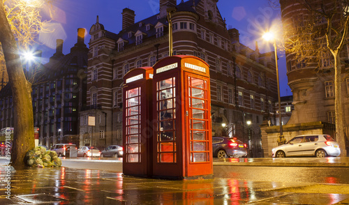 old telephone cabins in London city. Night scene