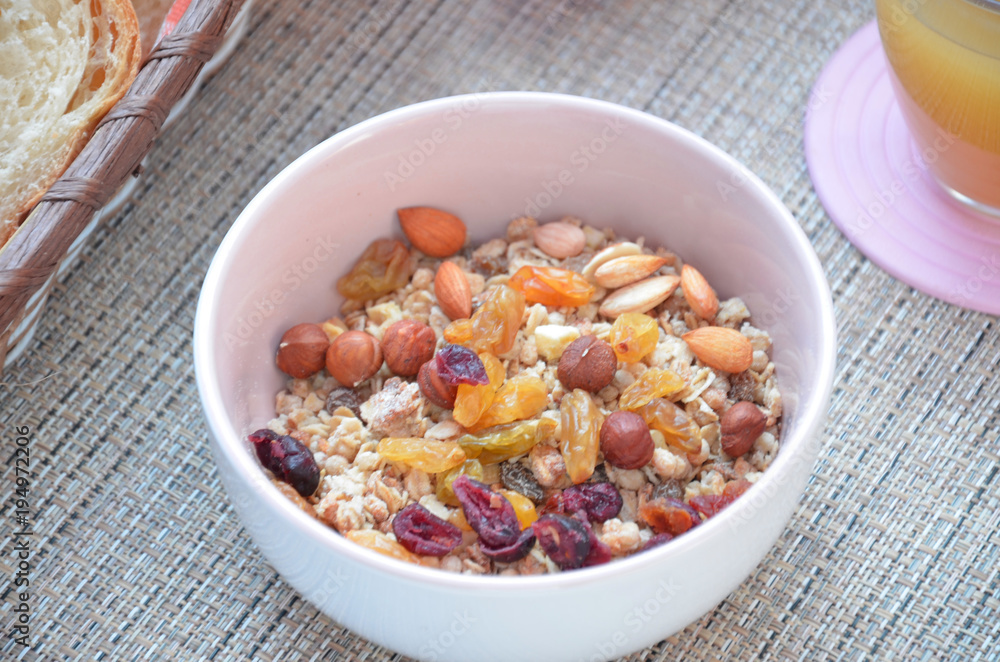 Healthy Breakfast: oatmeal, muesli, dried fruit, fruit juice, crispy bread top view Healthy Breakfast: oatmeal, muesli, dried fruit, fruit juice, crispy bread top view
