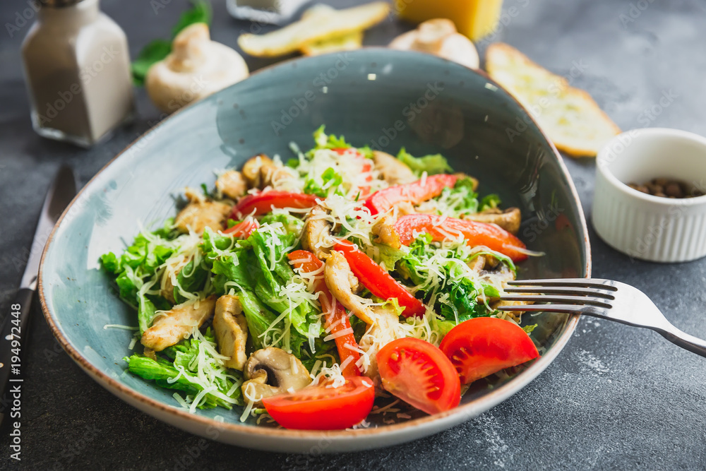 Vegetarian salad with mushroom, cheese, lettuce and pepper in a plate. Closeup view Vegetarian salad with mushroom, cheese, lettuce and pepper in a plate. Closeup view
