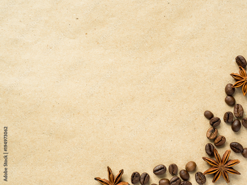 Coffee on paper background with coffee beans and star anise, copy space, top view. Coffee on paper background with coffee beans and star anise, copy space, top view.