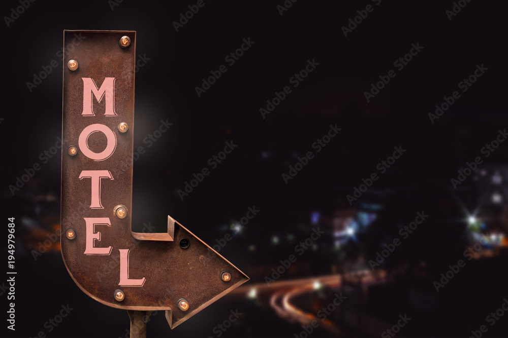  Motel signboard, on the road. Retro style