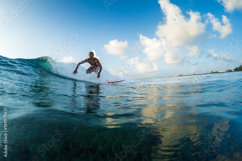 Surfer rides the wave. Extreme sport and active lifestyle concept