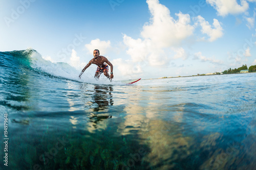 Photography Surfer rides the wave. Extreme sport and active lifestyle concept