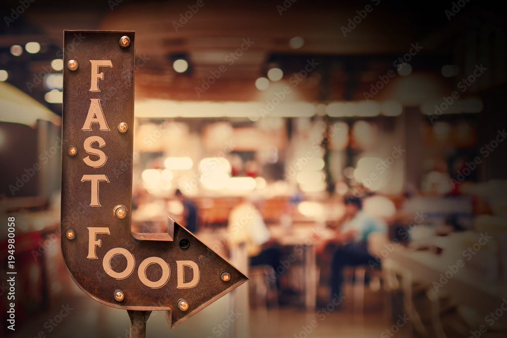 Fastfood title signboard, in front of the store . Retro style Fastfood title signboard, in front of the store . Retro style