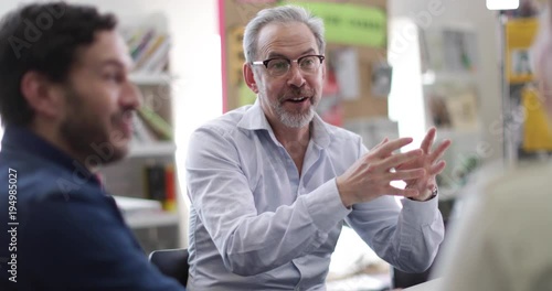 Senior male in a meeting