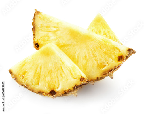 three slices of pineapple isolated on white background
