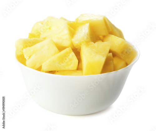 bowl with cubes of pineapple isolated on white background