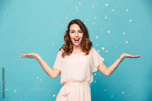 Konstfotografi Portrait of a happy beautiful girl wearing dress