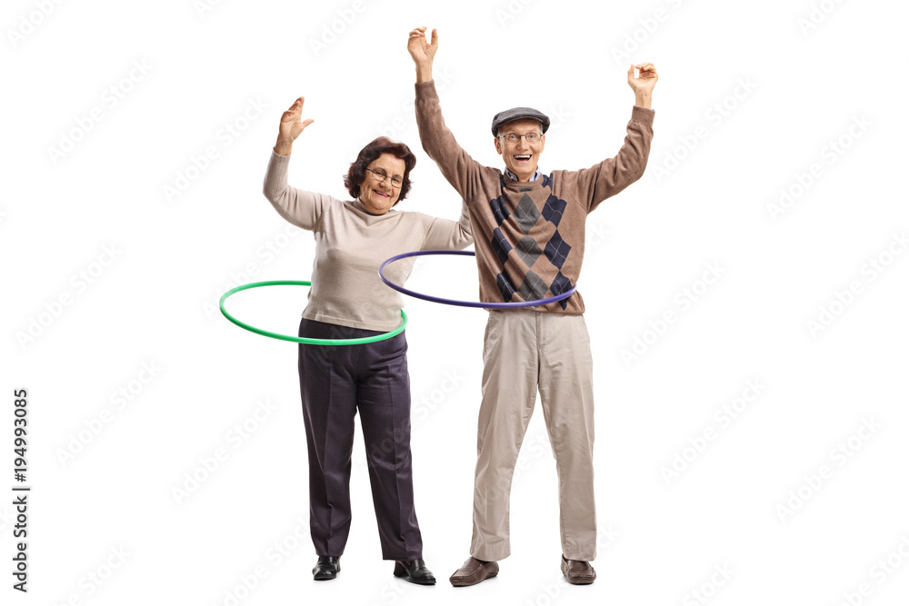 Two cheerful seniors with hula-hoops Two cheerful seniors with hula-hoops