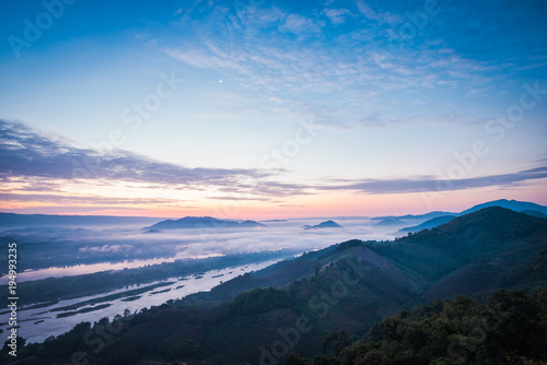 Sunrise and the mist in winter morning